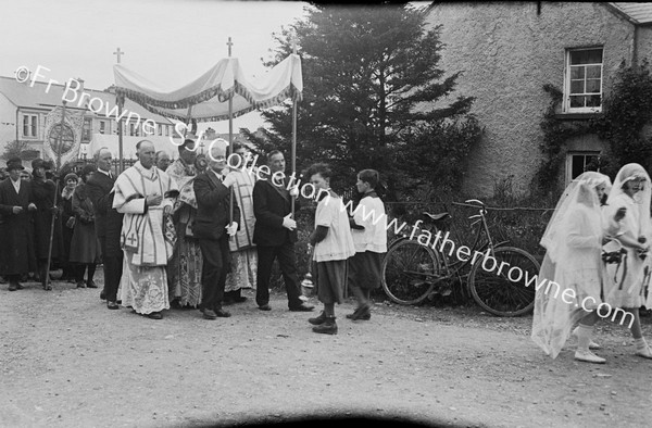 CORPUS XTI PROCESSION CANOPY REV.J.O'DOWD CELEB, REV.J.WINS DEACON, REV.MCCARRICK SUBD.